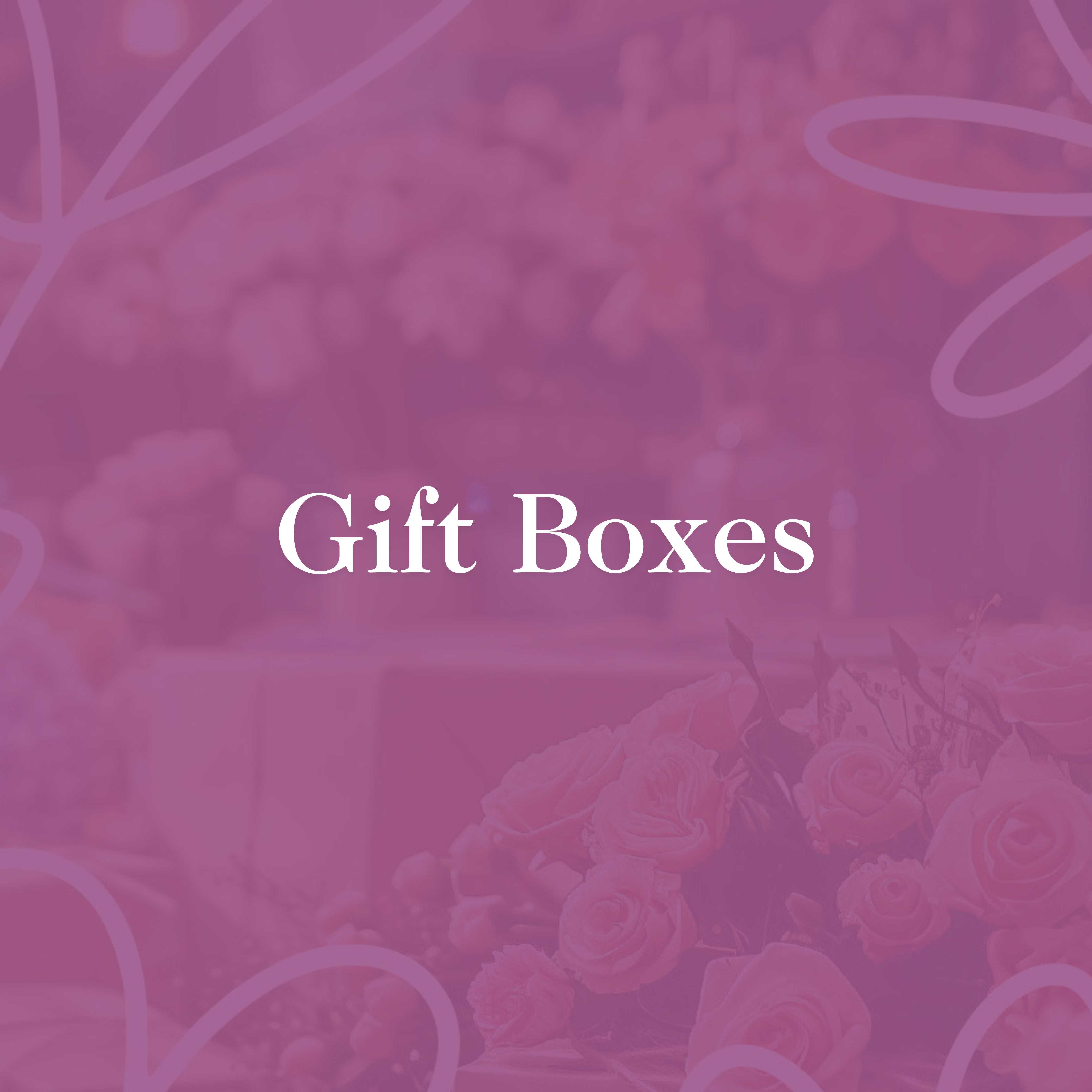 Assorted gift boxes containing fresh pears, homemade jams, and artisan breads, neatly arranged and packaged, perfect for thoughtful gifting. Fabulous Flowers and Gifts.