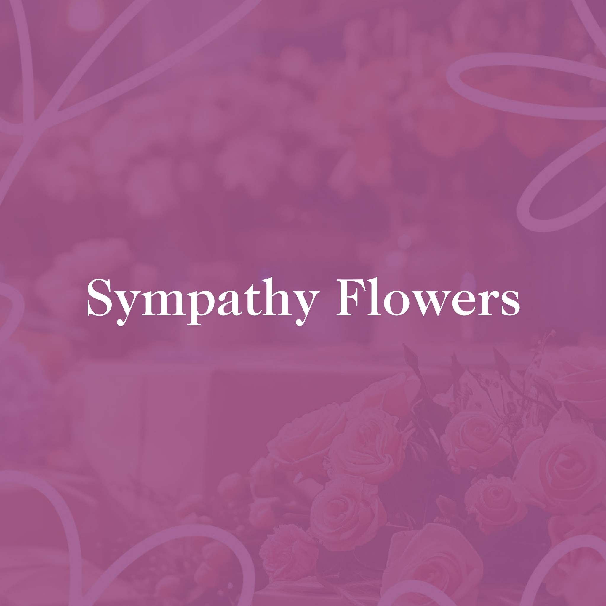 Sympathy Flowers by Fabulous Flowers and Gifts on a soft pink background with delicate floral accents for condolences.