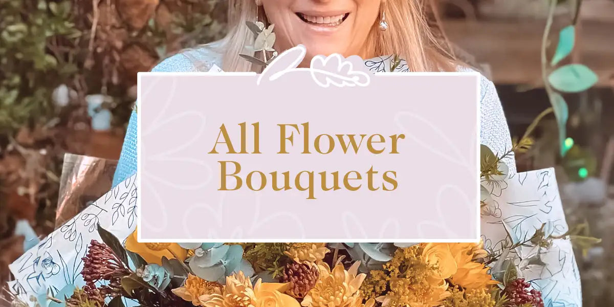 Smiling woman holding bunch of yellow flowers for the All Flower Bouquets collection by Fabulous Flowers and Gifts