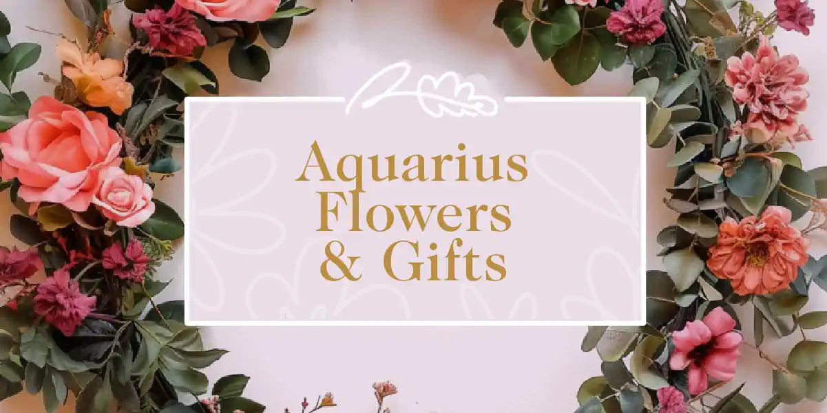 Image of Aquarius Flowers & Gifts banner featuring a floral wreath with pink and peach flowers. Fabulous Flowers and Gifts. Aquarius Collection.