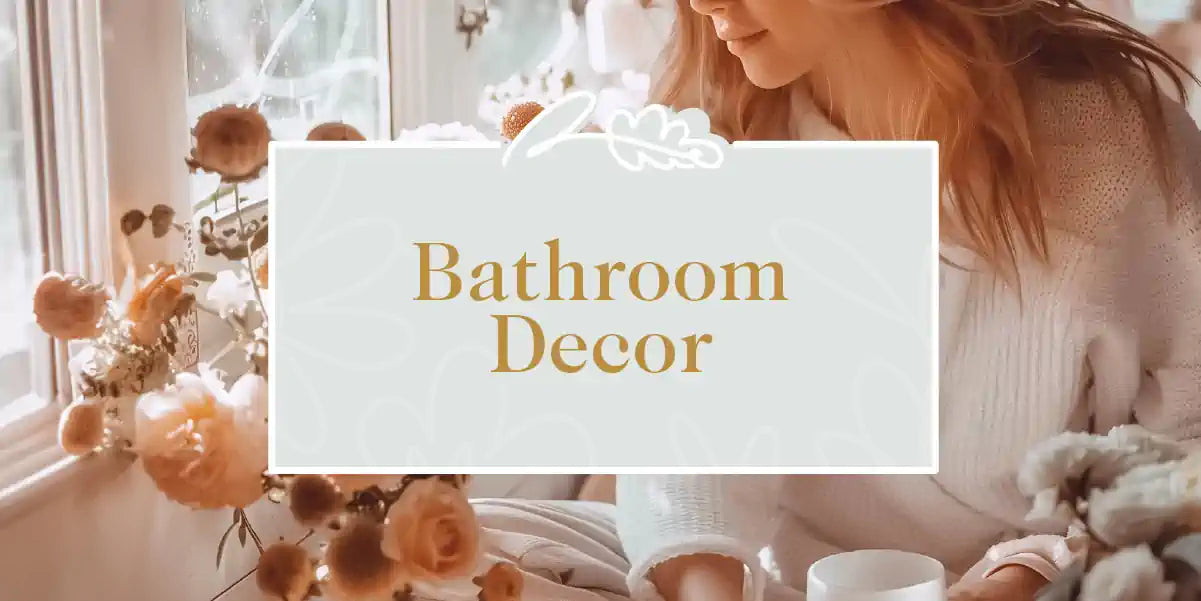 A cozy bathroom setting with a woman in a white robe, surrounded by elegant floral arrangements near a window. Bathroom Decor Collection. Fabulous Flowers and Gifts.