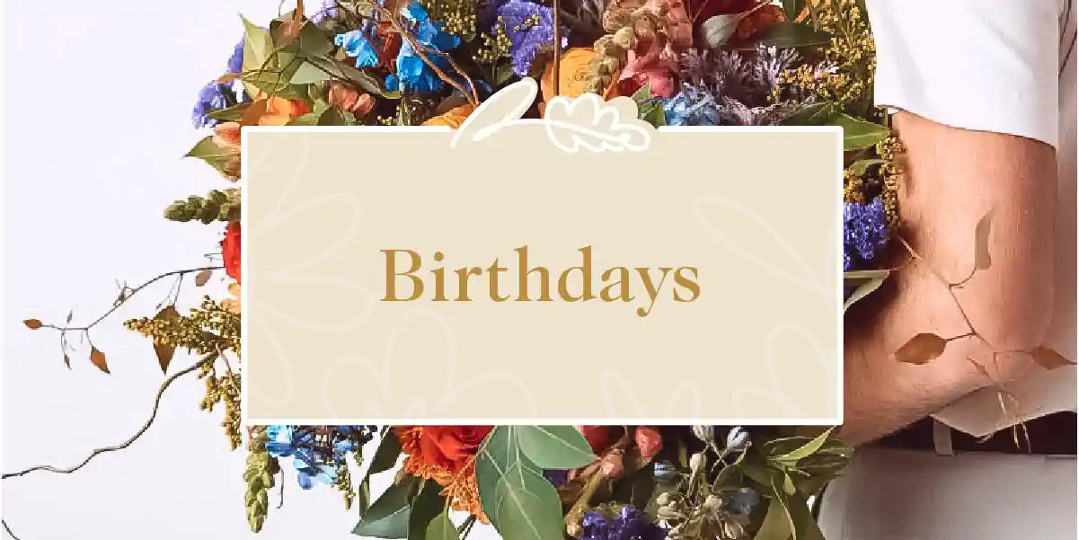 A person holding a vibrant and colorful bouquet of flowers, perfect for birthday celebrations. Birthday Collection. Fabulous Flowers and Gifts.