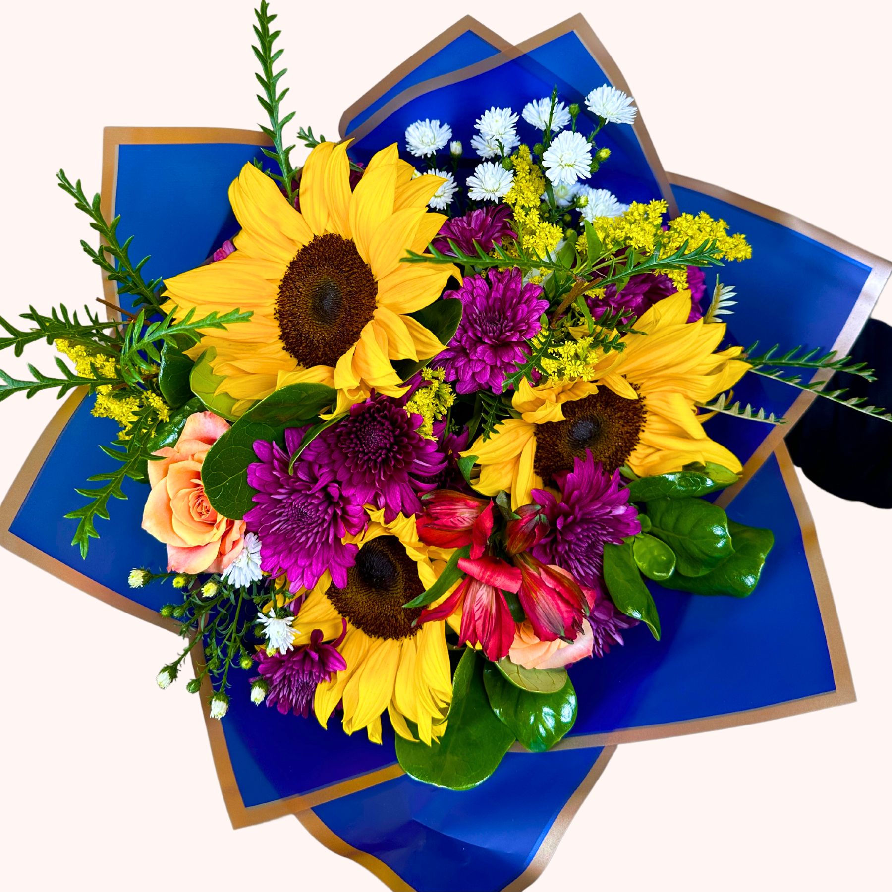 Blooming Sunshine Flower Bouquet featuring sunflowers, purple chrysanthemums, pink alstroemerias, orange roses, and white daisies - Fabulous Flowers and Gifts