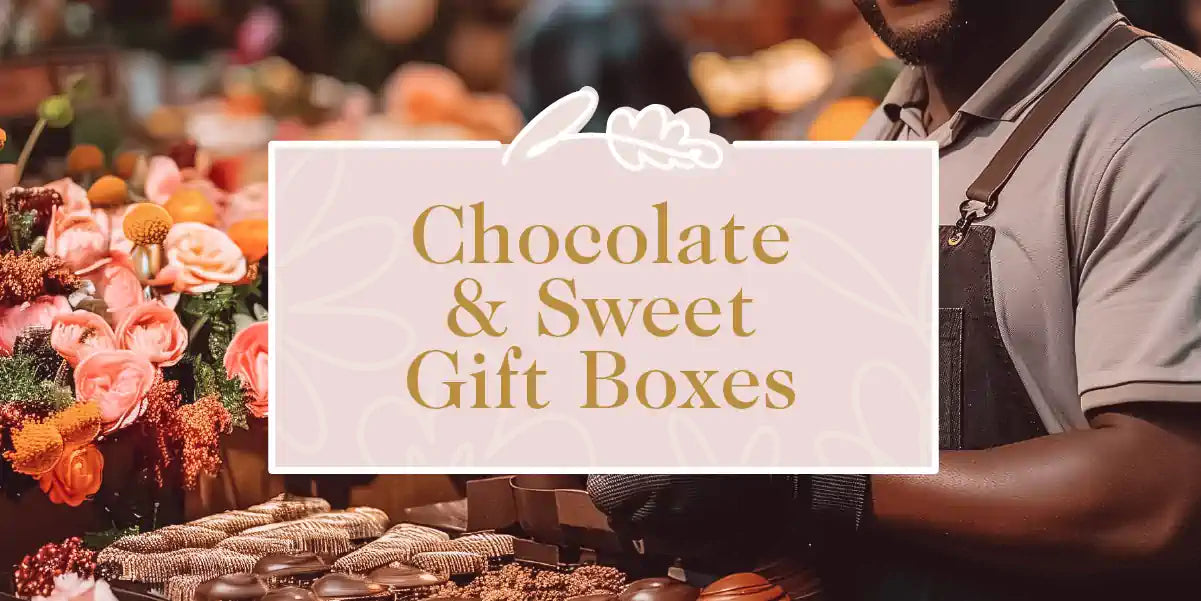 An array of luxurious chocolates and sweets displayed alongside vibrant flower arrangements. Fabulous Flowers and Gifts - Chocolate & Sweet Gift Boxes