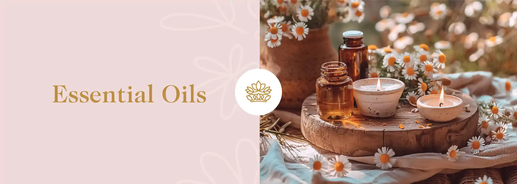 Tranquil setting with essential oil bottles, a lit candle, and fresh chamomile flowers on a rustic wooden table, capturing the essence of natural aromatherapy, available from Fabulous Flowers and Gifts.