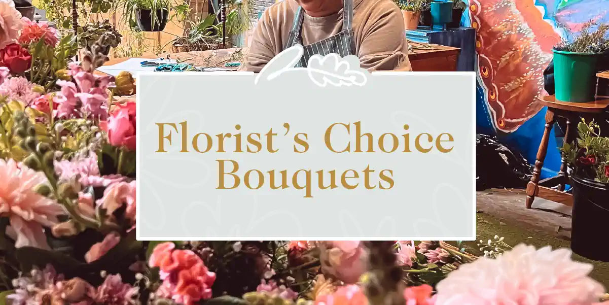A florist preparing a custom bouquet with a variety of fresh flowers. Fabulous Flowers and Gifts - Florist's Choice Bouquets