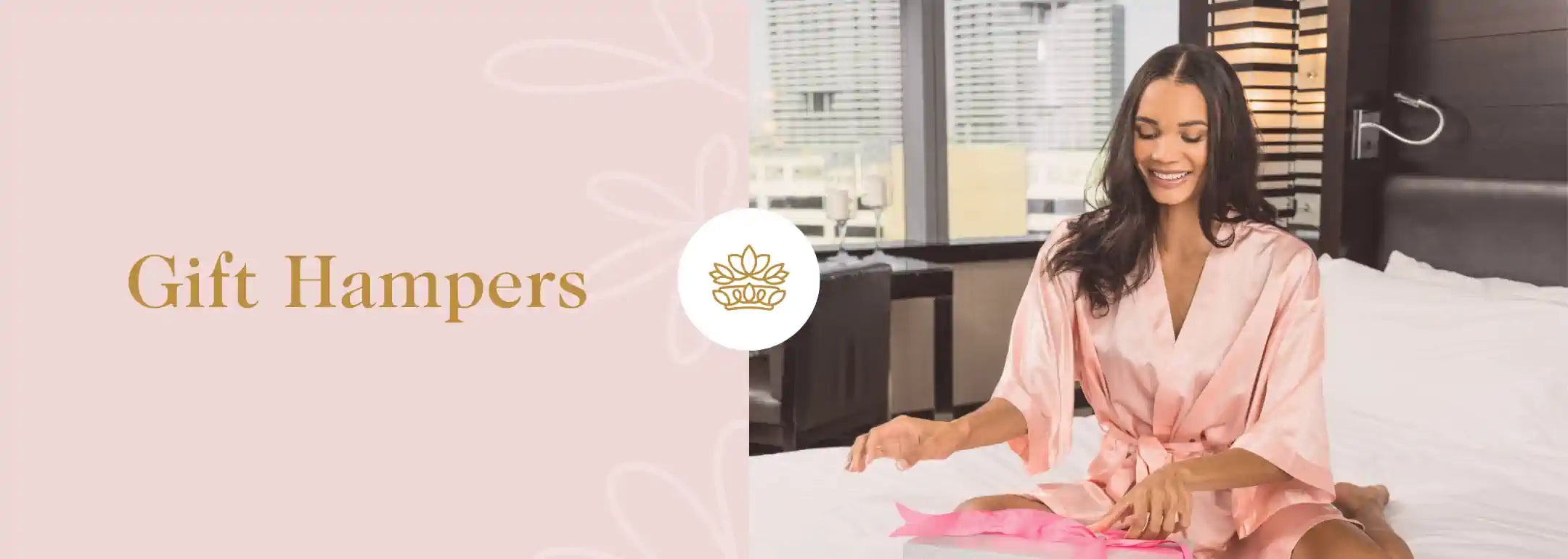 Woman opening gift hampers in her modern hotel room from Fabulous Flowers and Gifts.