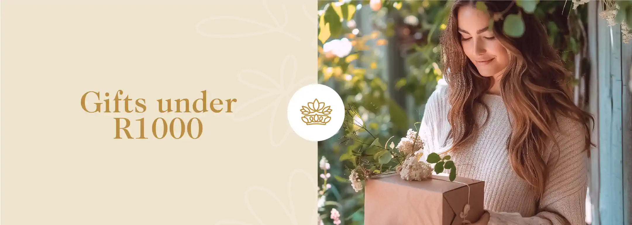 Woman holding a gift box in a garden, surrounded by lush greenery and flowers, from the Gifts under R1000 Collection at Fabulous Flowers and Gifts.