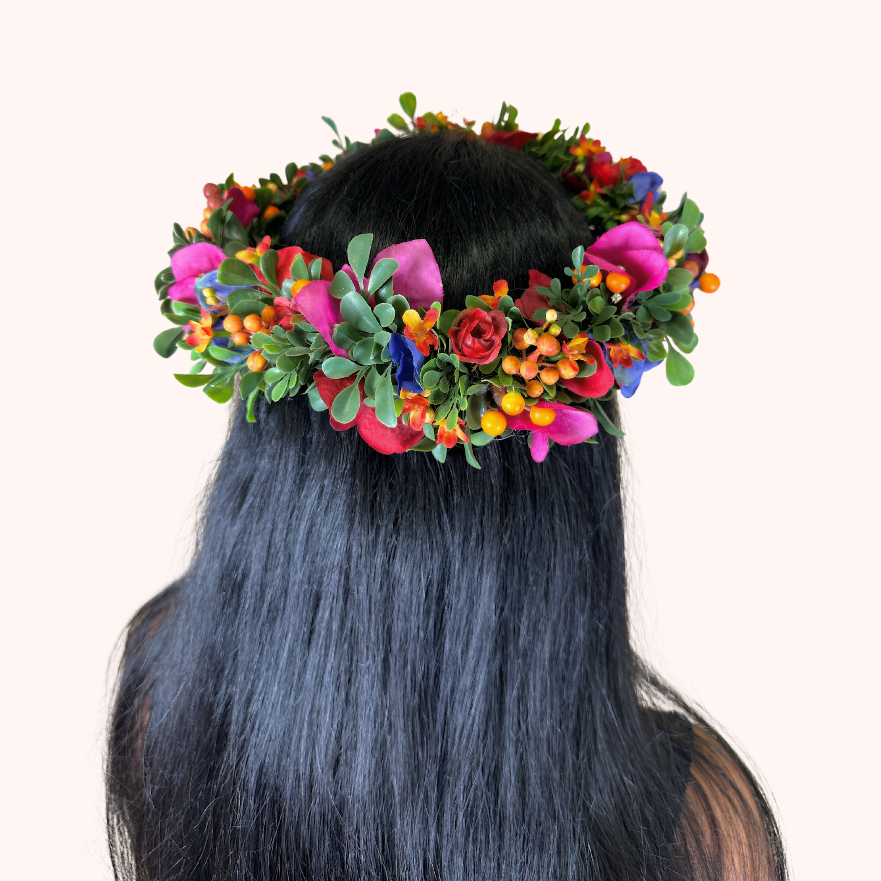 Back view of a woman with a vibrant floral crown, Fabulous Flowers and Gifts