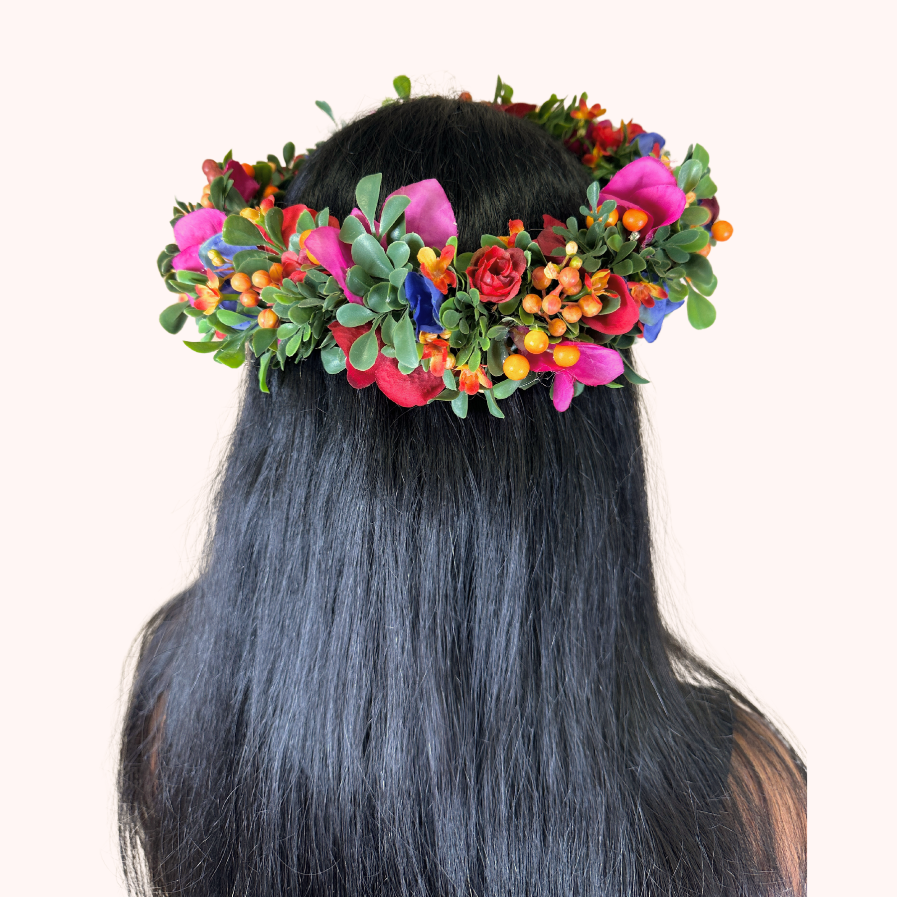 Detailed look at a colorful floral crown worn by a woman, Fabulous Flowers and Gifts