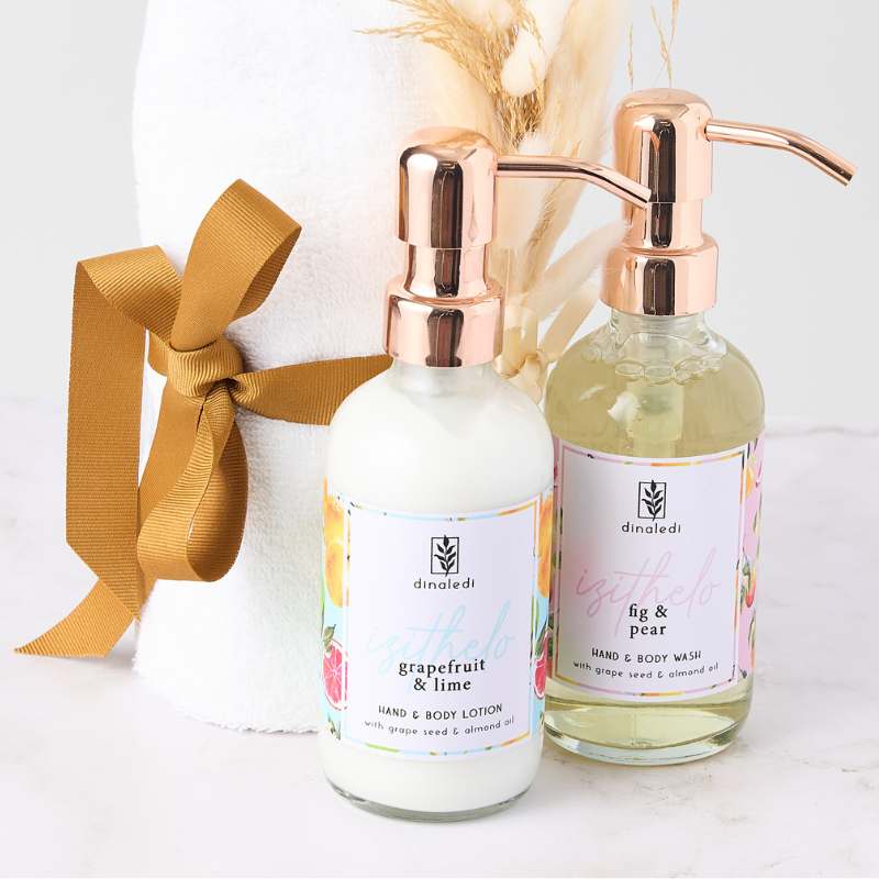 Golden Touch Pamper Gift Set with grapefruit & lime lotion, fig & pear body wash, and towel. Perfect for luxury gifts.