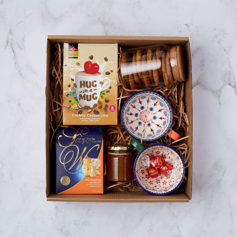 Gift box with Hug in a Mug cappuccino, nougat, cookies, honey, and two hand-painted bowls