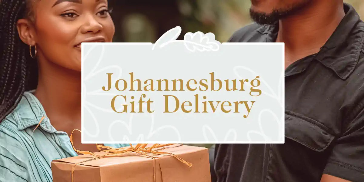 Johannesburg Gift Delivery Collection: A smiling woman in a green shirt receiving a beautifully wrapped gift box from a man in a black shirt. Fabulous Flowers and Gifts.