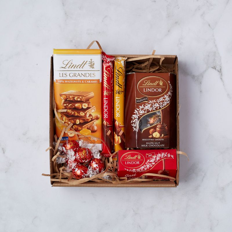 Gift box with Lindt Les Grandes hazelnuts & caramel, Lindor bars, and Lindt hazelnut chocolates