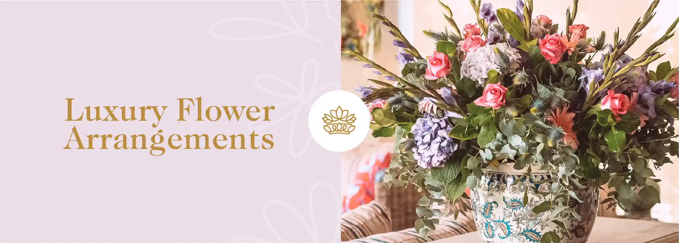 An elaborate flower arrangement in a decorative vase, epitomising 'Luxury Flower Arrangements'. Fabulous Flowers and Gifts - Luxury Flower Arrangements