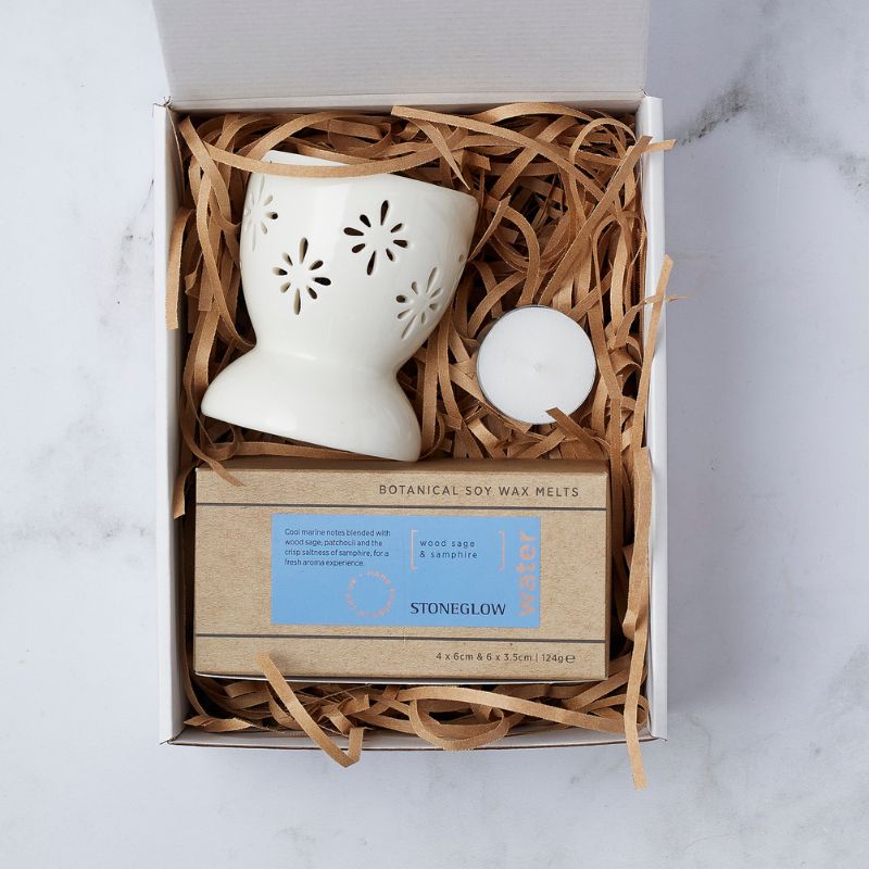 Mindful Calm Gift Set featuring a ceramic oil burner, soy wax melts, and tea light candle for relaxation.