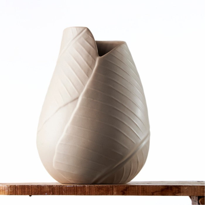 Elegant Modern Swirl Vase with a dynamic twisted design in a matte grey finish, ideal for sophisticated decor.