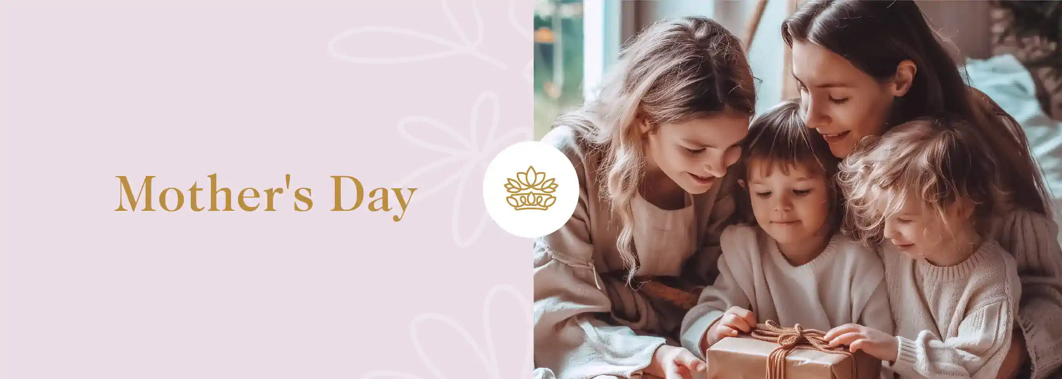 A heartwarming scene of a mother and her children sharing a tender moment while opening a gift together, symbolizing the love and appreciation celebrated on Mothers Day - Fabulous Flowers and Gifts.