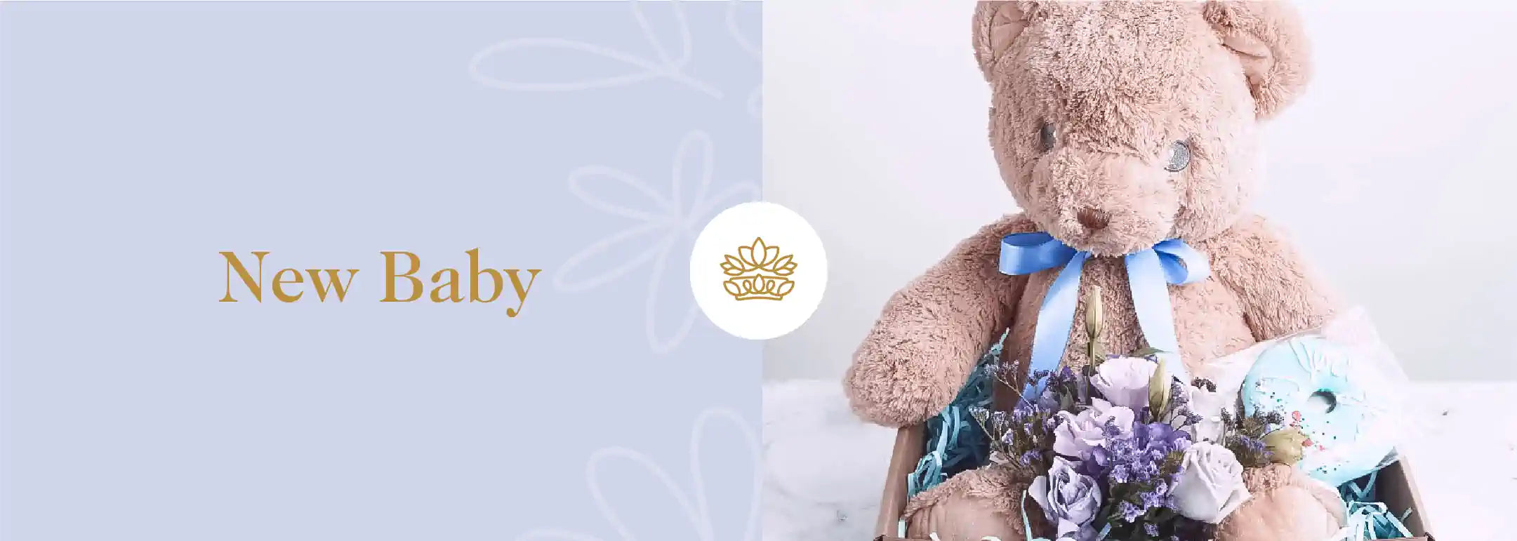 A large plush teddy bear accompanied by a flower arrangement and baby gifts. Fabulous Flowers and Gifts - New Baby