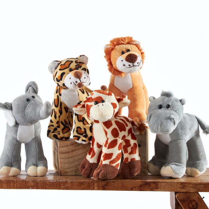 Close-up view of Safari Softies, a set of soft stuffed animals including a lion, elephant, and giraffe, ideal for children's educational toys and safari-themed nurseries.