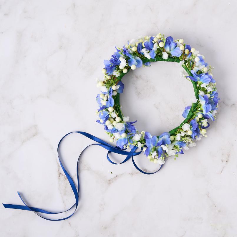 Sapphire Mist Blue Flower Crown with blue and white blooms, featuring a delicate ribbon tie.