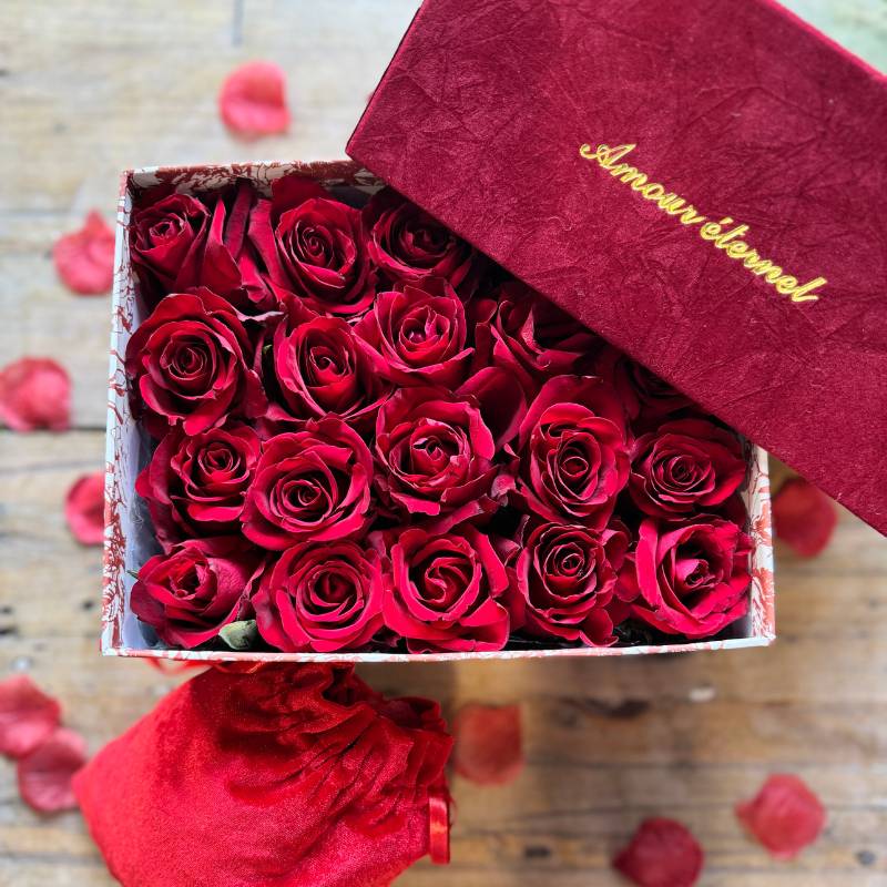 Scarlet Sonnets gift box with vibrant red roses in a luxurious red box embossed with 'Amour éternel' - Fabulous Flowers & Gifts.