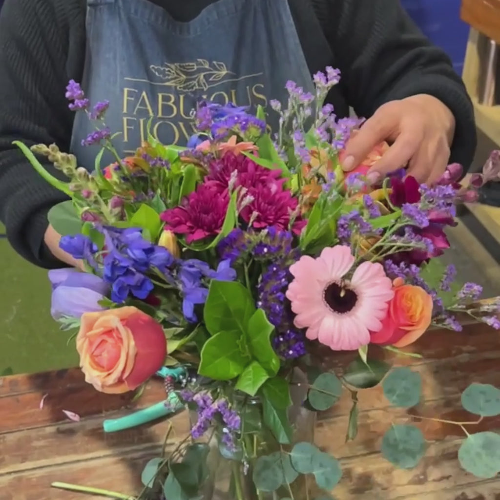 Video of Loose and Lovely Flower Arrangement in vibrant colours. 