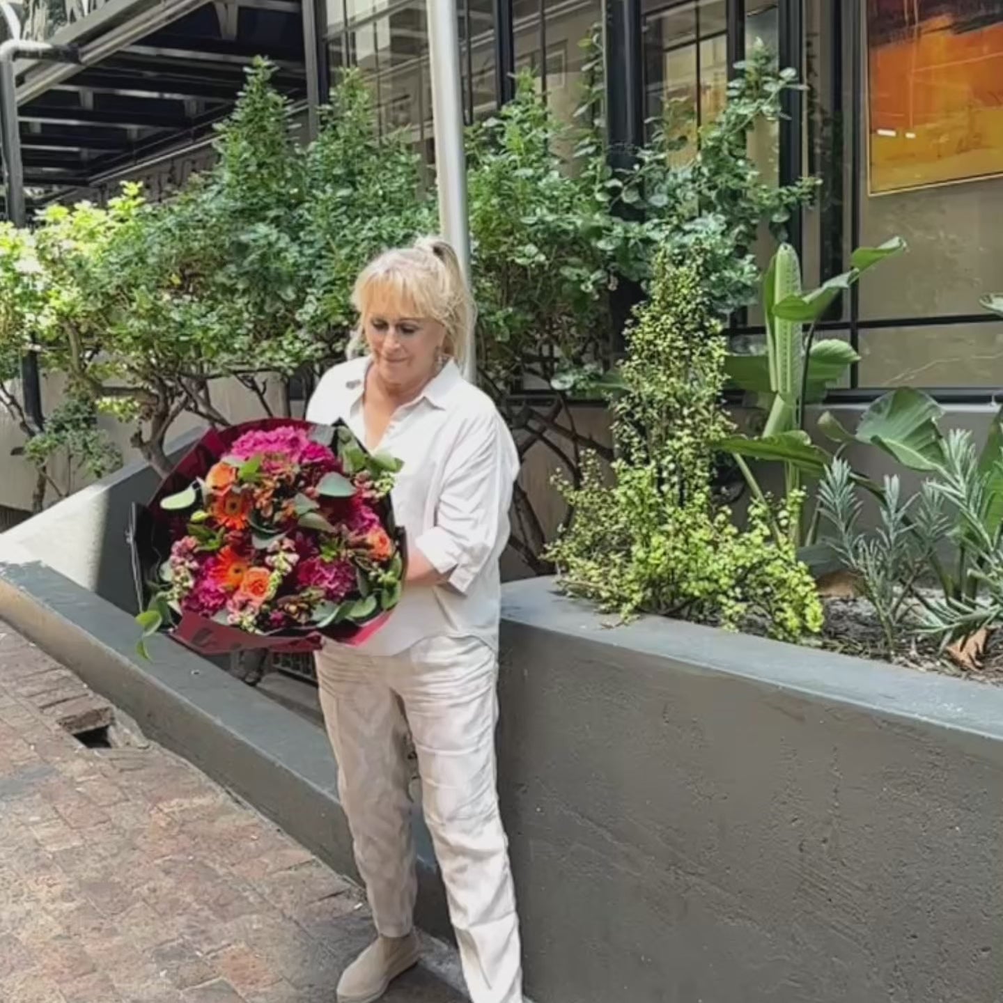 Video showcasing the vibrant Storyteller's Garden bouquet with hydrangeas, gerberas, roses, and snapdragons, highlighting colours and textures.